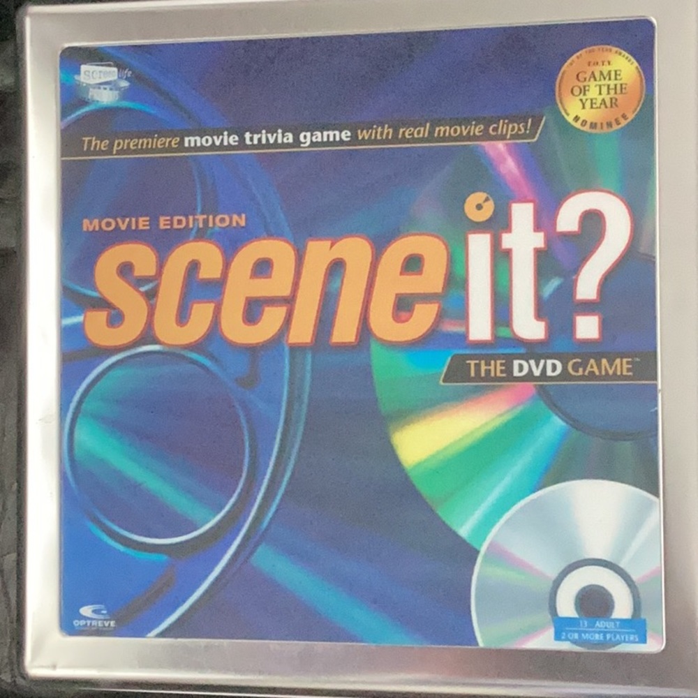 Vintage Scene it? DVD game movie edition in metal tin box